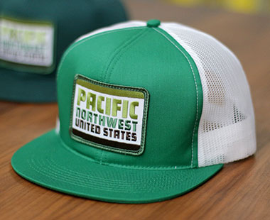 merch_pnw_action_cap_green_white.jpg