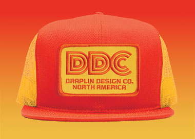 merch_thick_lines_ddc_action_cap_yellow_orange.jpg